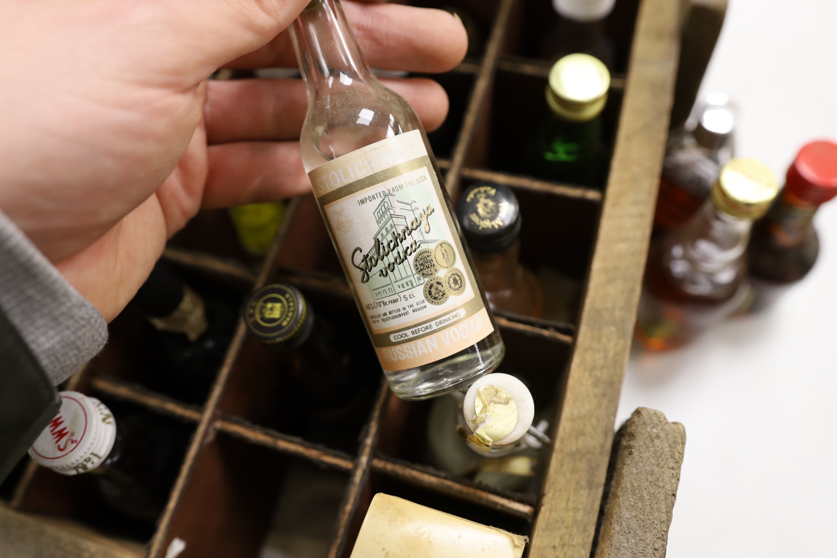 Sixty miniature spirits in collectors wooden box